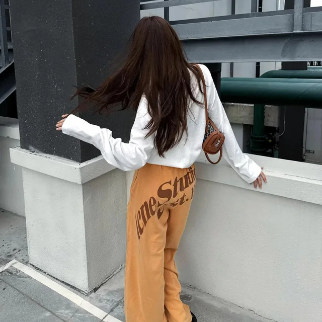 Acne Studios Orange Logo Print Wide Leg Pants